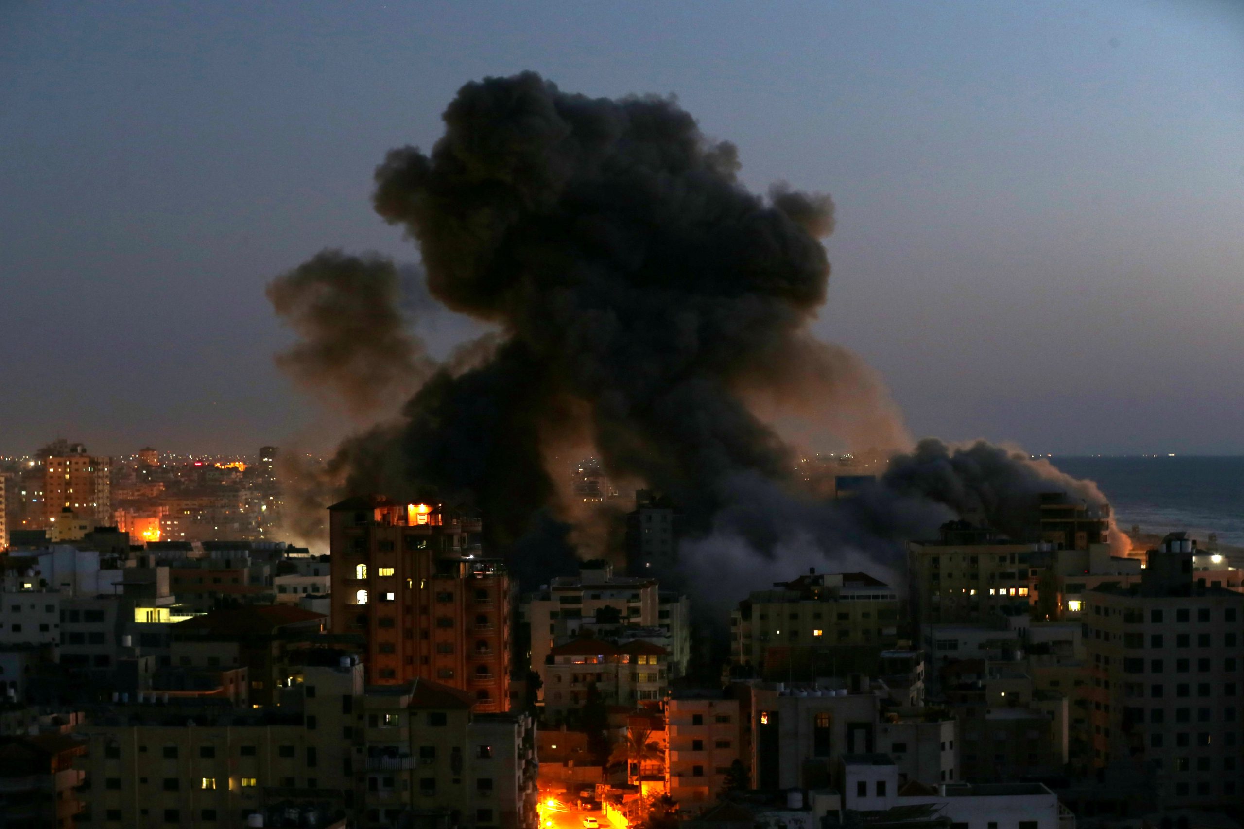 Israeli Military Warns Gaza City Residents to Leave, Bombs High-Rise Tower